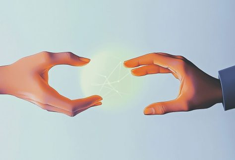hands about to touch third entity
